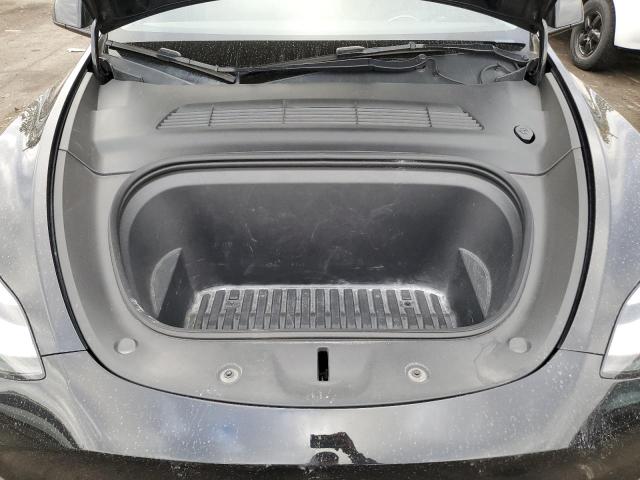 Photo 11 from auction – 2022 TESLA MODEL Y with VIN 7SAYGAEE7NF573563