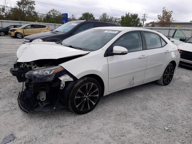 TOYOTA COROLLA L 2017 with VIN 5YFBURHE3HP677790 - Photo from auction