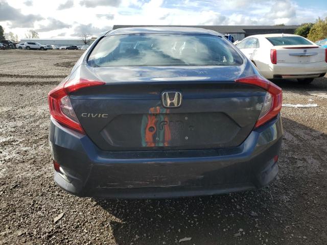 Photo 6 from auction – 2018 HONDA CIVIC LX with VIN 19XFC2F62JE203554