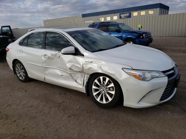Photo 4 from auction – 2015 TOYOTA CAMRY HYBR with VIN 4T1BD1FK7FU165083