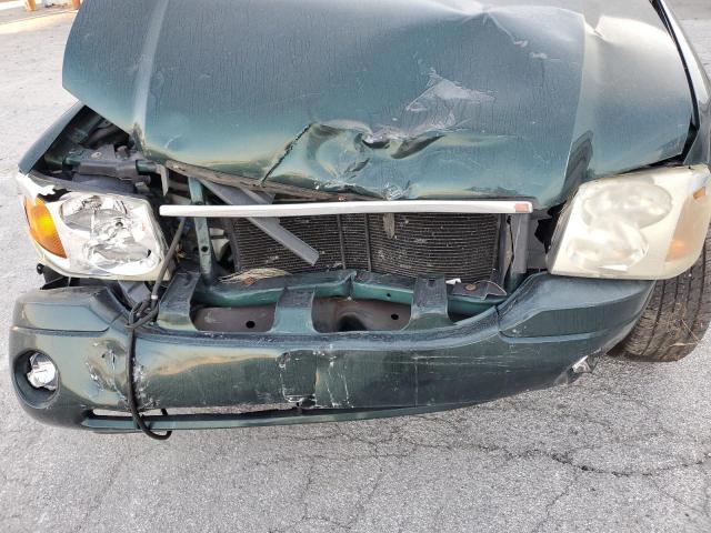 Photo 12 from auction – 2005 GMC ENVOY with VIN 1GKDS13S652329610