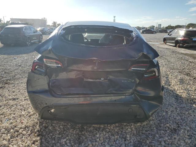 Photo 6 from auction – 2022 TESLA MODEL Y with VIN 7SAYGAEE5NF310035