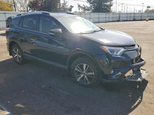 Photo 4 from auction – 2017 TOYOTA RAV4 XLE with VIN JTMWFREV9HJ713728