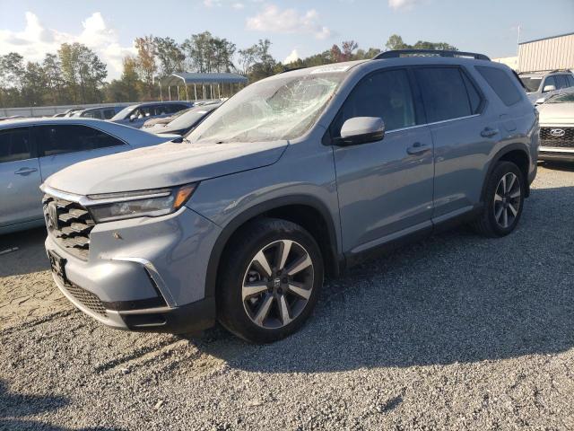 HONDA PILOT TOUR 2024 with VIN 5FNYG2H70RB015463 - Photo from auction