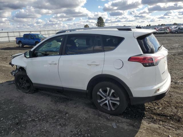 Photo 2 from auction – 2017 TOYOTA RAV4 LE with VIN JTMBFREV7HJ158812