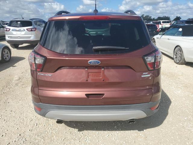 Foto 6 de la subasta – 2018 FORD ESCAPE SE con VIN 1FMCU0GD7JUC11356