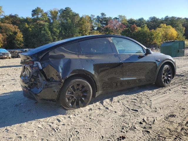 Photo 3 from auction – 2023 TESLA MODEL Y with VIN 7SAYGAEE3PF915156