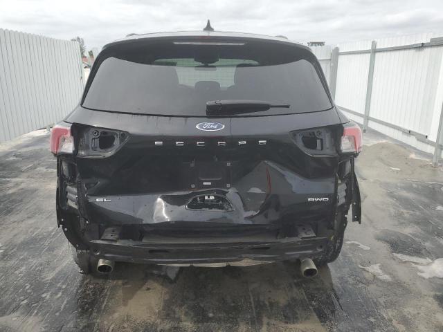 Photo 6 from auction – 2021 FORD ESCAPE SEL with VIN 1FMCU9H62MUA64484