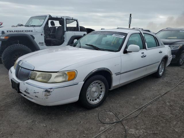 Photo 1 from auction – 1999 LINCOLN TOWN CAR E with VIN 1LNHM81W2XY664767