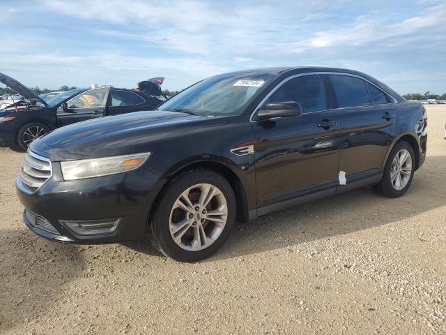 FORD TAURUS SEL 2014 with VIN 1FAHP2E83EG143232 - Photo from auction
