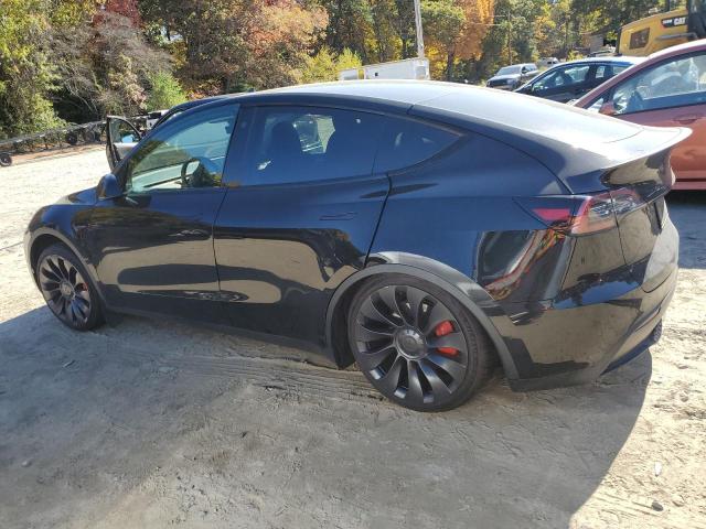 Photo 2 from auction – 2022 TESLA MODEL Y with VIN 7SAYGDEF0NF572135