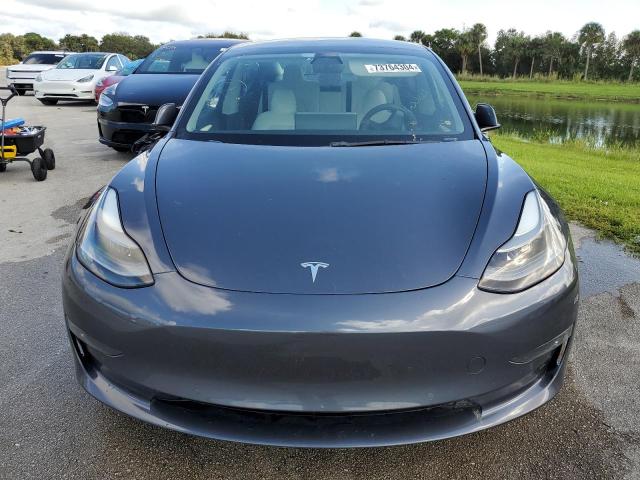 Photo 5 from auction – 2022 TESLA MODEL 3 with VIN 5YJ3E1EC7NF318908