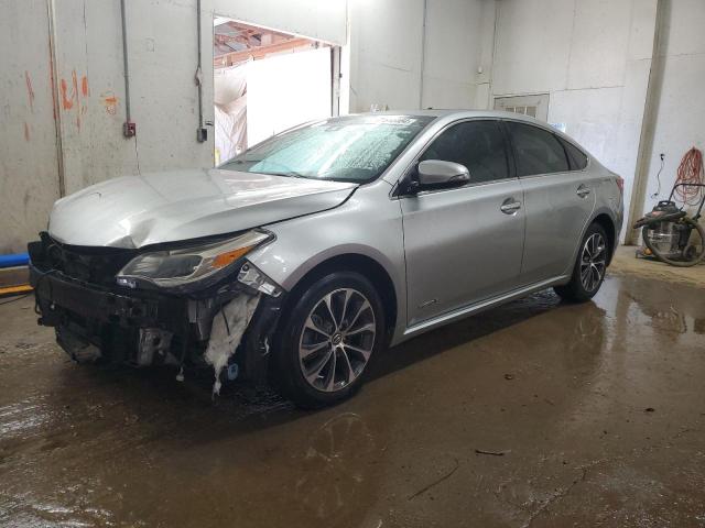 TOYOTA AVALON HYB 2018 with VIN 4T1BD1EB5JU059676 - Photo from auction