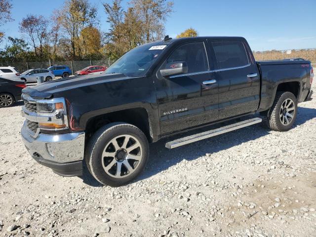 CHEVROLET SILVERADO 2018 with VIN 3GCUKREC0JG346162 - Photo from auction