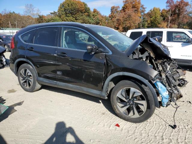 Photo 4 from auction – 2015 HONDA CR-V TOURI with VIN 5J6RM4H96FL048609