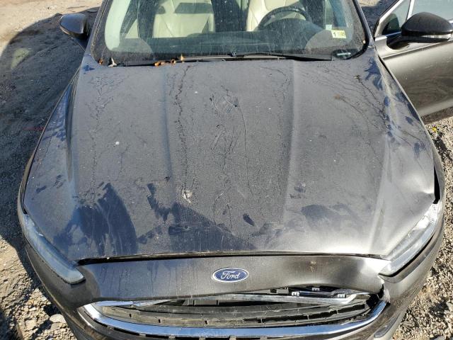 Photo 11 from auction – 2016 FORD FUSION TIT with VIN 3FA6P0D99GR126923