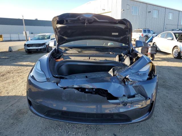 Photo 5 from auction – 2023 TESLA MODEL Y with VIN LRWYGDEE9PC265872