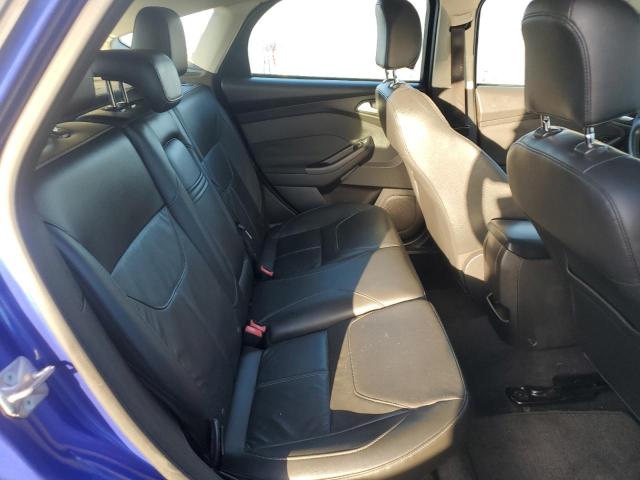 Foto 11 de la subasta – 2015 FORD FOCUS SE con VIN 1FADP3K21FL333415