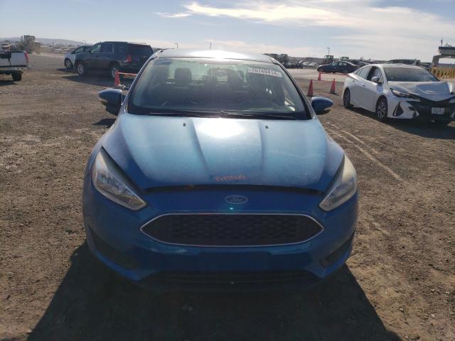 Photo 5 from auction – 2015 FORD FOCUS SE with VIN 1FADP3F24FL333354