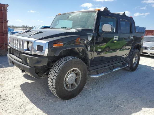 HUMMER H2 SUT 2005 with VIN 5GRGN22U65H113129 - Photo from auction