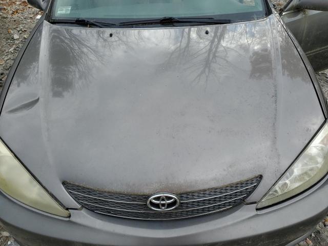 Photo 11 from auction – 2004 TOYOTA CAMRY LE with VIN 4T1BE30K64U813527