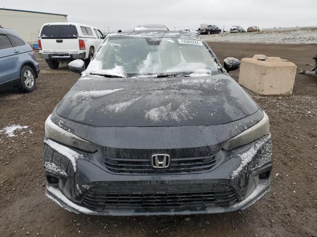 Photo 5 from auction – 2022 HONDA CIVIC EX with VIN 2HGFE2F36NH100987