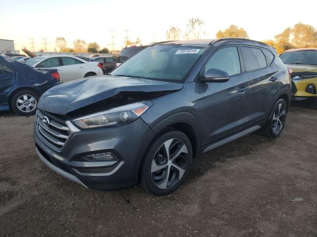 HYUNDAI TUCSON VAL 2018 with VIN KM8J33A25JU803437 - Photo from auction