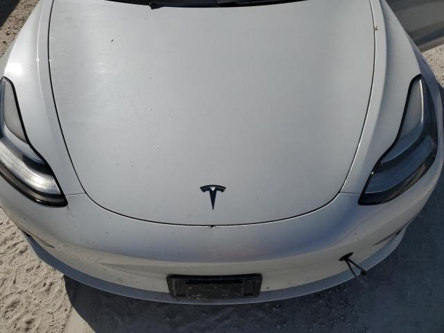 Photo 11 from auction – 2020 TESLA MODEL 3 with VIN 5YJ3E1EB4LF667321