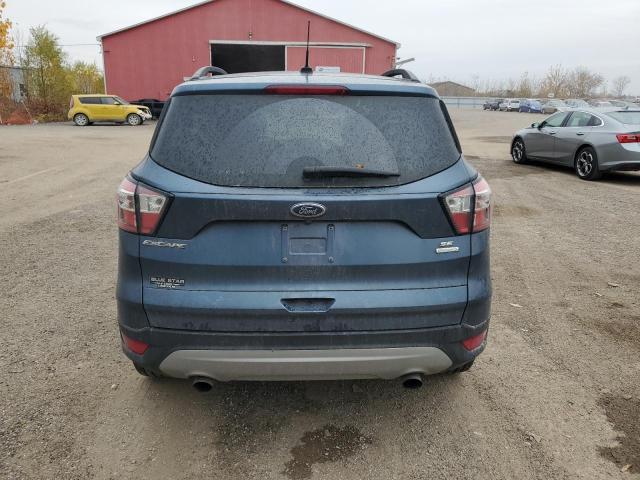 Foto 6 de la subasta – 2018 FORD ESCAPE SE con VIN 1FMCU0GD0JUC82995