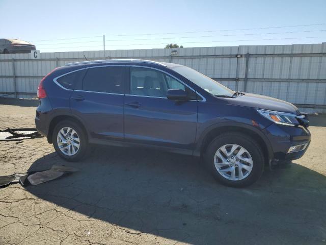 Photo 4 from auction – 2015 HONDA CR-V EXL with VIN 2HKRM4H78FH623673