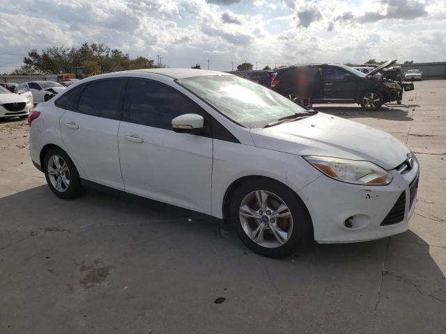 Foto 4 de la subasta – 2014 FORD FOCUS SE con VIN 1FADP3F26EL224411