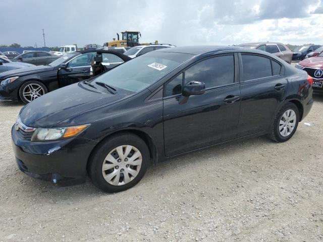 HONDA CIVIC LX 2012 with VIN 2HGFB2F59CH581938 - Photo from auction