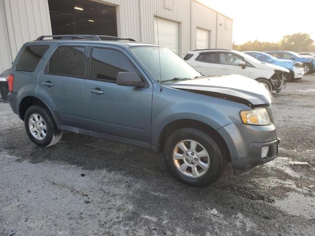 Photo 4 from auction – 2011 MAZDA TRIBUTE I with VIN 4F2CY0C79BKM02153