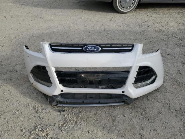 Photo 12 from auction – 2015 FORD ESCAPE TIT with VIN 1FMCU0J95FUC26823