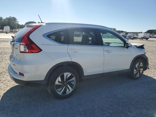 Photo 3 from auction – 2016 HONDA CR-V TOURI with VIN 5J6RM3H95GL010400