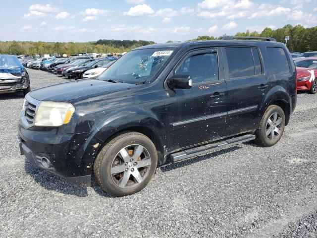 HONDA PILOT TOUR 2012 with VIN 5FNYF4H99CB065611 - Photo from auction
