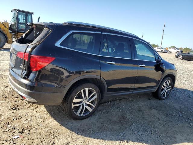 Photo 3 from auction – 2018 HONDA PILOT ELIT with VIN 5FNYF6H02JB023310