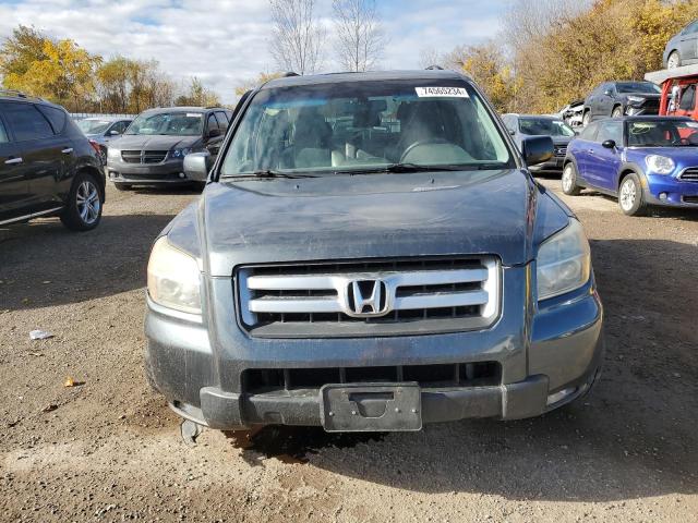 Photo 5 from auction – 2006 HONDA PILOT EX with VIN 2HKYF18576H548502
