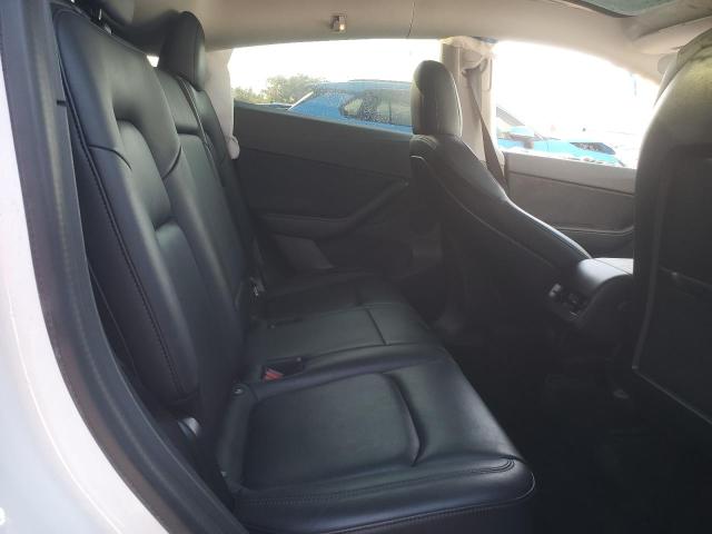 Photo 11 from auction – 2021 TESLA MODEL Y with VIN 5YJYGDEE2MF065594