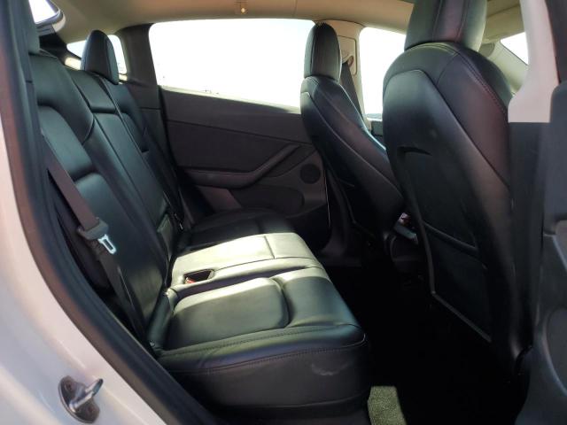 Photo 11 from auction – 2022 TESLA MODEL Y with VIN 7SAYGDEE8NF362504
