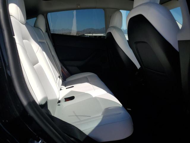 Photo 11 from auction – 2023 TESLA MODEL Y with VIN 7SAYGDEE9PF608303