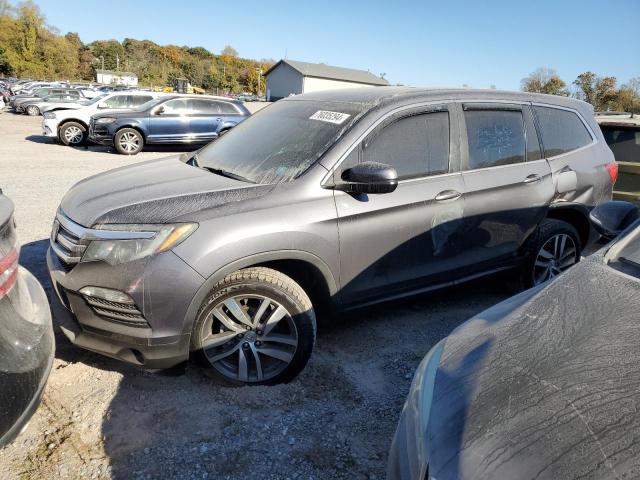 HONDA PILOT EXL 2018 with VIN 5FNYF6H62JB038426 - Photo from auction