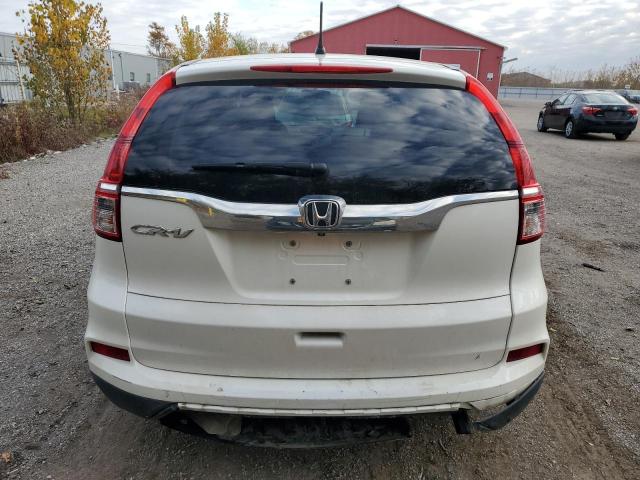 Photo 6 from auction – 2015 HONDA CR-V LX with VIN 2HKRM3H32FH002484