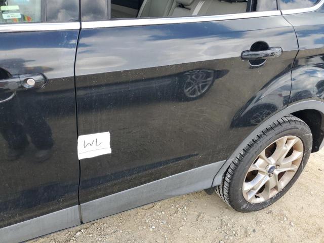 Photo 13 from auction – 2015 FORD ESCAPE TIT with VIN 1FMCU0J97FUA93532