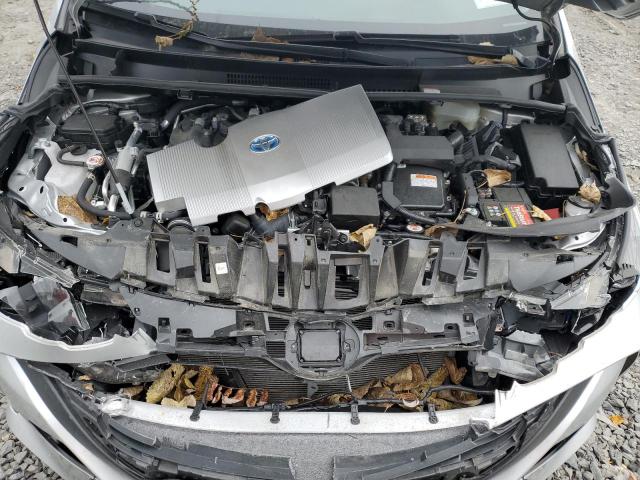 Photo 11 from auction – 2021 TOYOTA PRIUS PRIM with VIN JTDKAMFP8M3194332