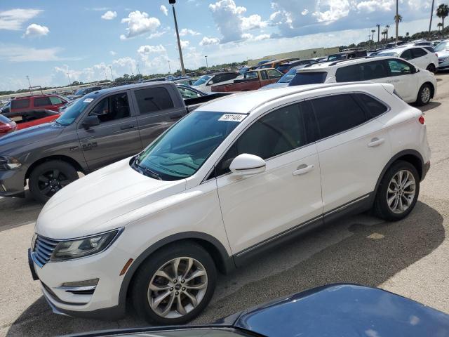 LINCOLN MKC 2015 with VIN 5LMCJ1A92FUJ05646 - Photo from auction