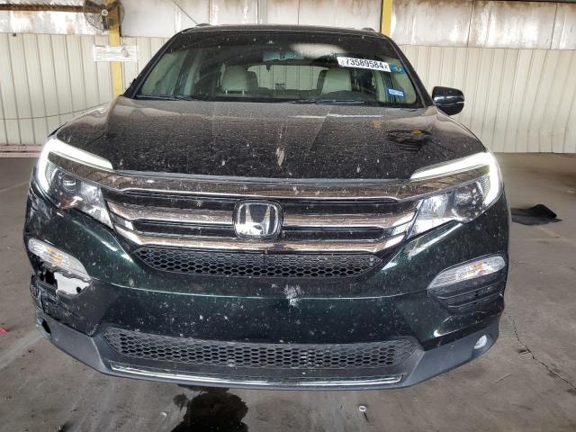 Photo 5 from auction – 2016 HONDA PILOT TOUR with VIN 5FNYF5H96GB001991