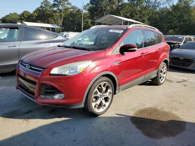 FORD ESCAPE 2014 with VIN 1FMCU0JXXEUD13856 - Photo from auction