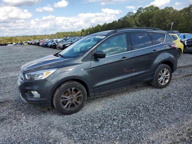 FORD ESCAPE SE 2018 with VIN 1FMCU0GD8JUD07349 - Photo from auction