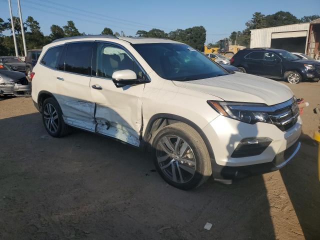 Photo 4 from auction – 2018 HONDA PILOT TOUR with VIN 5FNYF5H99JB002527